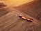 Corn maize harvest, aerial view of tractor