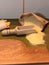 Corn meal Pouring Out JUte Sack and Culinary Bailer