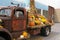 Corn and mums in a fall display on a truck