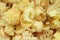 Corn popcorn with fruit syrup background