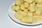 Corn sugar sticks snacks on a white plate