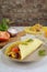 Corn Tortilla Wraps with Tuna, Yellow Bell Pepper, Avocado, and Purple Onions