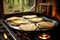 corn tortillas cooking on a stove-top griddle