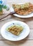 Corn vanilla and pandan thai waffle on white dish , selection f