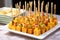 cornbread cubes on toothpicks for hors doeuvres