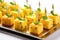 cornbread cubes on toothpicks for hors doeuvres