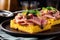 cornbread open-faced sandwich with honey glazed ham topping