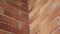 Corner of a brick wall close up
