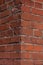 Corner brick wall, red old brick