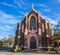 Corner Church With Double Door Entrance & Stained Glass Front