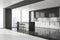 Corner of grey panoramic kitchen with bar stools, wooden elements