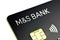 Corner of M&S bank credit card on a white background. Photo with selective focus