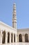 Corner of Mosque Courtyard with Arabesque Arcade and Minaret Rising in Background, Portrait