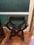 A corner in a room in the Iulia Hasdeu palace with a orange couch