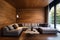 Corner sofa in room with wooden lining paneling wall and ceiling. Minimalist home interior design of modern living room