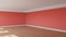 Corner of the Sunny Interior with Light Red Walls, a White Ceiling and Cornice