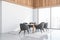 Corner view of panoramic white dining room with dark grey chairs