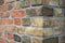 Corner of a vintage brick wall , stone brick wall edge