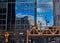 Corner of Wacker Drive and Lake Street in Chicago Loop, with Merchandise Mart reflected in a mirrored building exterior, and Photo