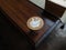 Corner wooden table and a cup of coffee