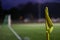 Cornerflag in football stadion with floodlight in the evening