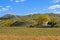 cornfield and mountain forest in the autumn