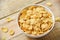 Cornflakes breakfast in bowl on wooden background cereal healthy food