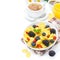 Cornflakes, fresh berries, cup of cappuccino and orange juice for breakfast isolated