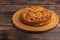 Cornish apple pie close up on rustic style wooden board