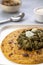 Cornmeal breads and  mustard leaves curry, famous Indian food specially prepared in winters, makki ki roti - sarson ka saag