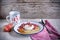 Cornmeal and greek yogurt breakfast with pomegranate