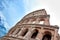 Corona virus. Colosseum in city center of Rome. coronavirus caution sign over coliseum in rome. Coliseum or Flavian Amphitheatre.