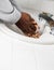 Corona Virus protection with African American man washing hands with mask in bathroom.  Health Concept for Virus prevention