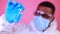 Corona Virus SARS-CoV-2 vaccination concept : man in pink studio wall background