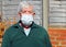 Corona virus. Senior man face mask for protection.