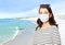 Corona virus tourism woman face mask beach