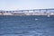 The Coronado Island to San Diego Bridge and the Shipyards Underneath with Boats on the San Diego Bay