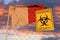 Coronavirus biohazard sign against the Maltese flag. Restricted border crossing or quarantine in Malta. Conceptual 3D