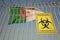 Coronavirus biohazard sign with flag of Algeria as a background. Algerian quarantine, conceptual 3D rendering