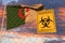 Coronavirus biohazard sign with flag of Algeria as a background. Algerian restricted entry or quarantine. Conceptual 3D