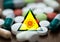 Coronavirus caution sign and drugs in pills