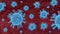 Coronavirus cells or bacteria molecules. Covid-19 virus floating in red blood background under microscope