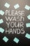 Coronavirus, chalk inscription on the blackboard - Please wash your hands and stickers with the virus. Danger and care. News