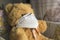 Coronavirus child: teddy bear with mask