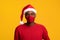 Coronavirus Christmas. Young Black Man Wearing Pretective Face Mask And Santa Hat