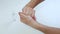 Coronavirus. Closeup hands man applies a disinfectant spray. Man spray a disinfectant on hands, to kill bacteria. Man clean hand b