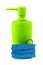Coronavirus concept with blue personal protective medicine equipment mask and green bottle packing of sanitizer, antiseptic with