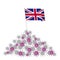 Coronavirus concept. Heap of viruses and United Kingdom flag at the top. Victory over the disease.