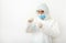 Coronavirus, covid-19. Doctor or scientist in protective medical suit, biological hazard, face mask creating vaccine in laboratory