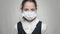 Coronavirus covid-19 epidemy outbreak health care concept of young sick little kid wearing medical mask and school uniform